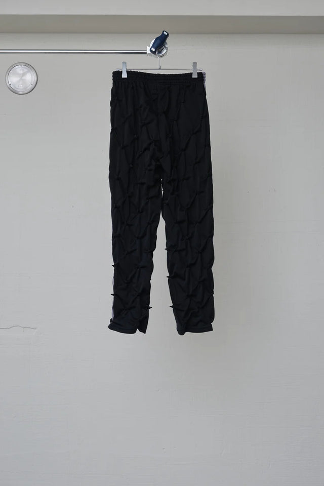 STUCK IN TRADITION TRACK PANTS［BODYSONG.］