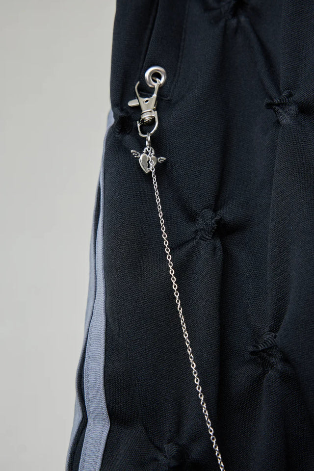 STUCK IN TRADITION TRACK PANTS［BODYSONG.］