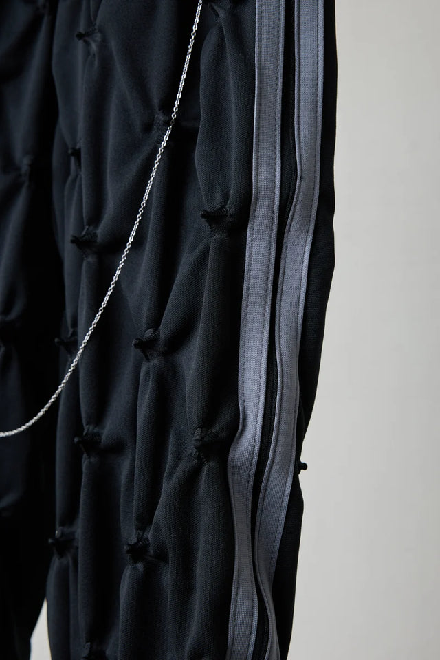 STUCK IN TRADITION TRACK PANTS［BODYSONG.］